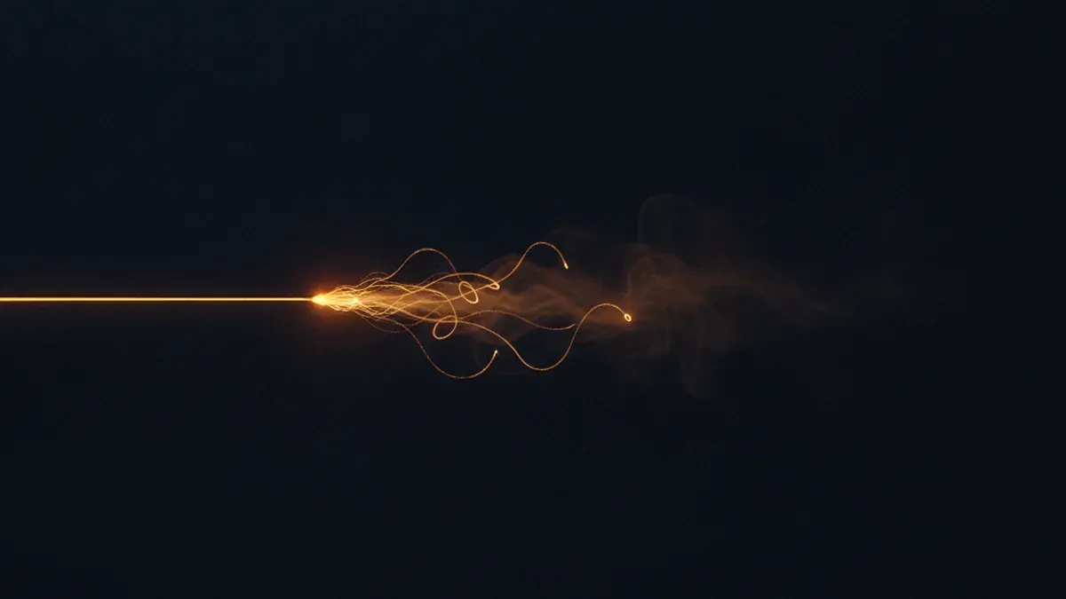 A fine warm glowing thread stretches across a wide dark surface and stops abruptly in the middle of the frame, fraying into a few loose fibres